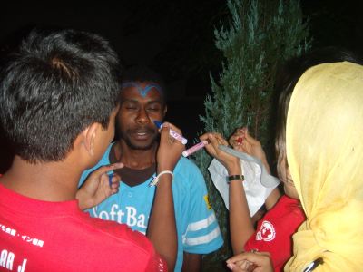 Lionel from Vanuatu getting his face painted